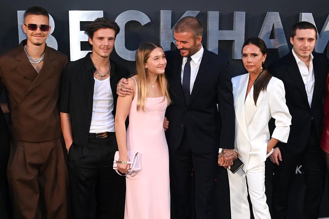 David Fisher/Shutterstock (L-R) Romeo Beckham, Cruz Beckham, Harper Beckham, David Beckham, Victoria Beckham and Brooklyn Beckham in October 2023