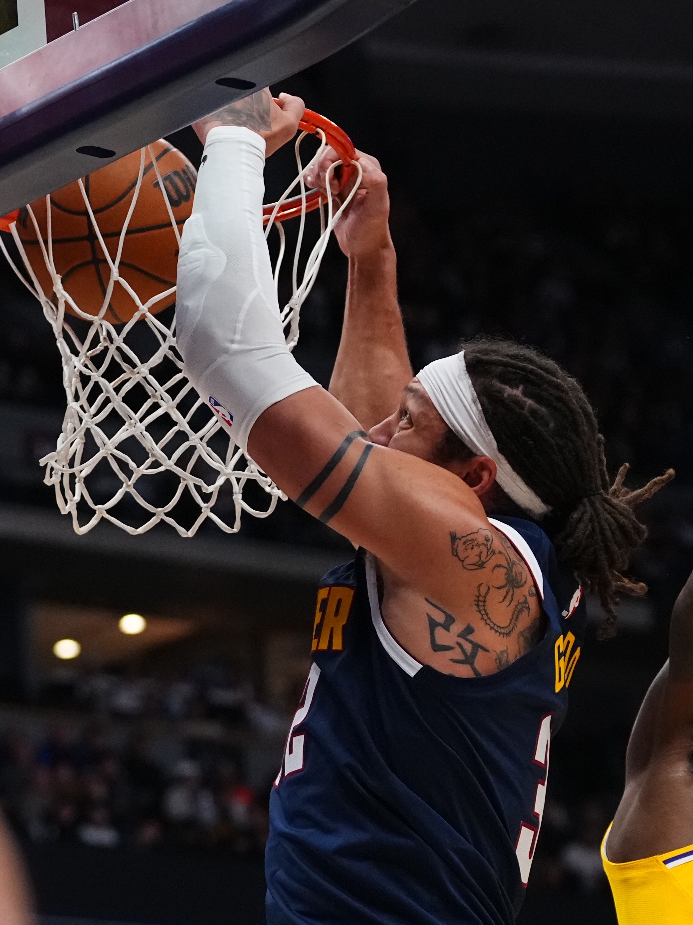 Denver Nuggets forward Aaron Gordon dunks against the Los Angeles Lakers during the second half of an NBA basketball game Tuesday, Jan. 20, 2026, in Denver. (AP Photo/Jack Dempsey)
