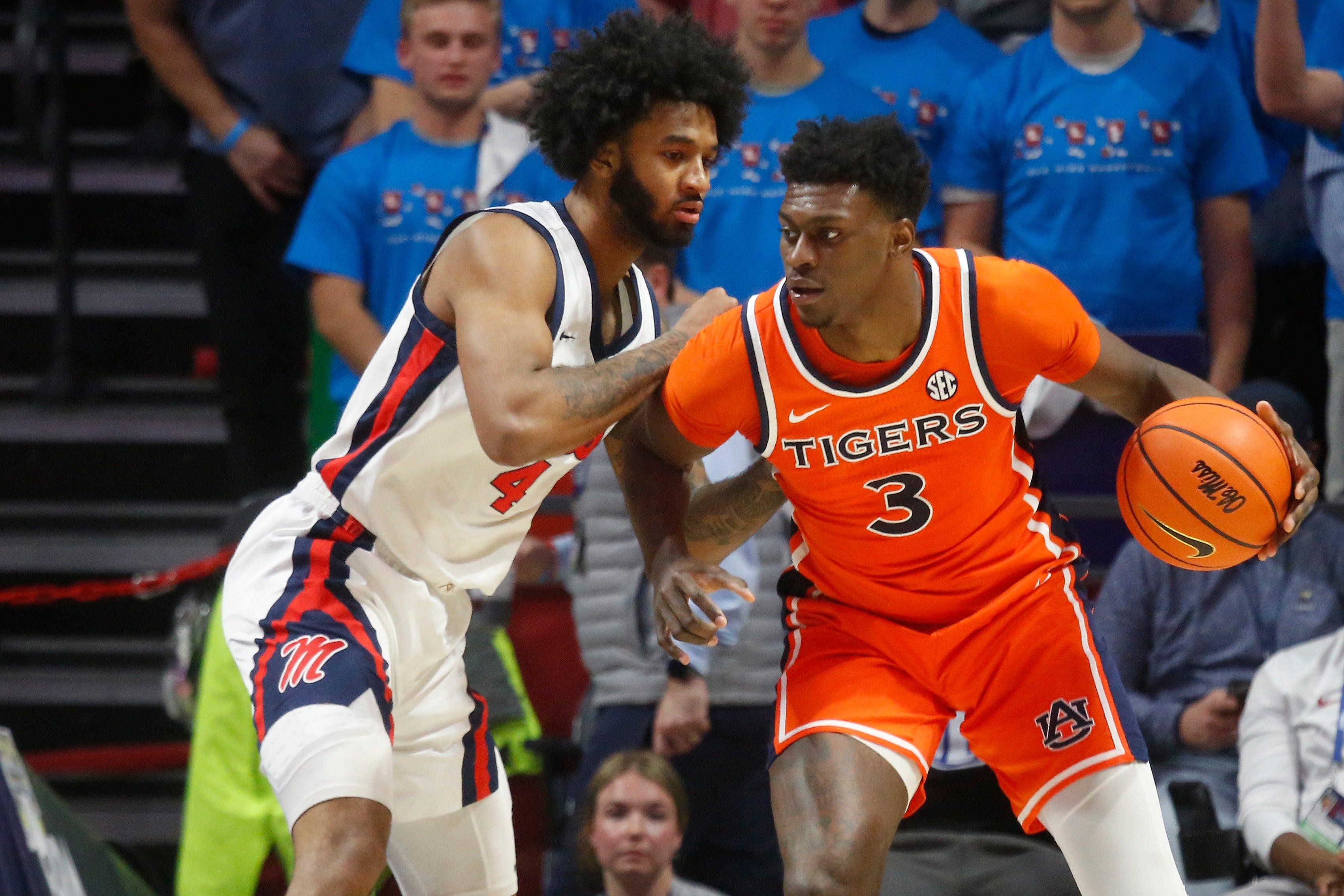 Jan 20, 2026; Oxford, Mississippi, USA; Auburn Tigers forward KeShawn Murphy (3) dribbles as Mississippi Rebels forward James Scott (4) defends during the second half at The Sandy and John Black Pavilion at Ole Miss. Mandatory Credit: Petre Thomas-Imagn Images