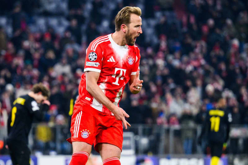 Kane leads Bayern into last 16, Barcelona fight back for win