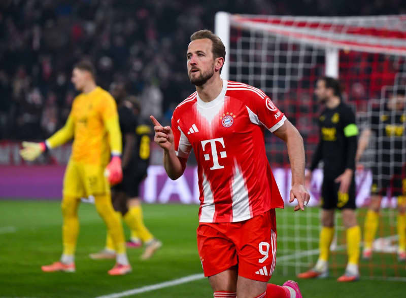 Bayern Munich's Harry Kane celebrates scoring his side's first goal during the UEFA Champions League soccer match between Bayern Munich and Union St. Gilloise at the Allianz Arena. Sven Hoppe/dpa