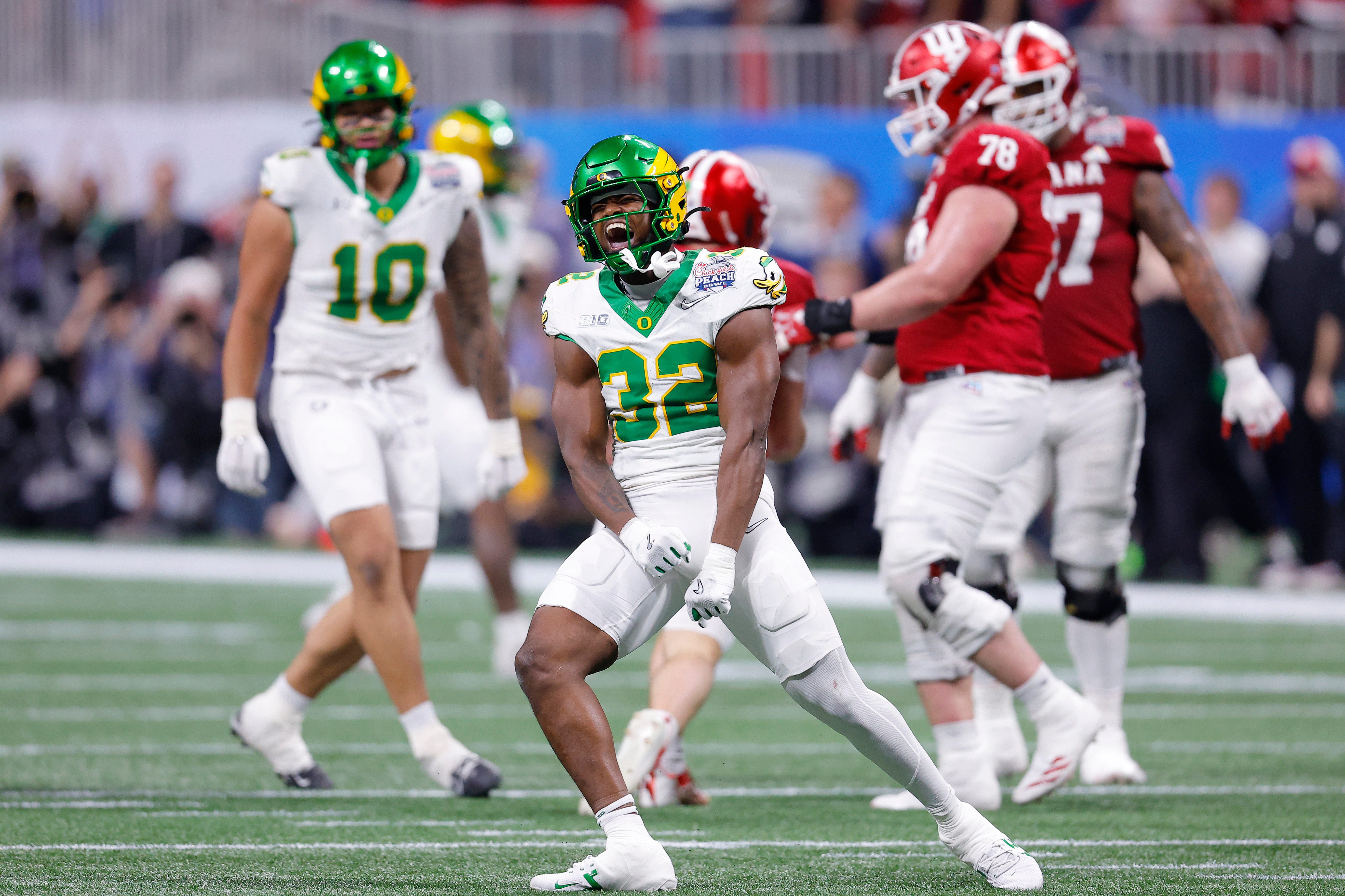 ATLANTA, GEORGIA - JANUARY 09: Nasir Wyatt #32 of the Oregon Ducks reacts after a tackle against the Indiana Hoosiers during the second quarter in the 2025 College Football Playoff Semifinal at the Chick-fil-A Peach Bowl at Mercedes-Benz Stadium on January 09, 2026 in Atlanta, Georgia. (Photo by Todd Kirkland/Getty Images)