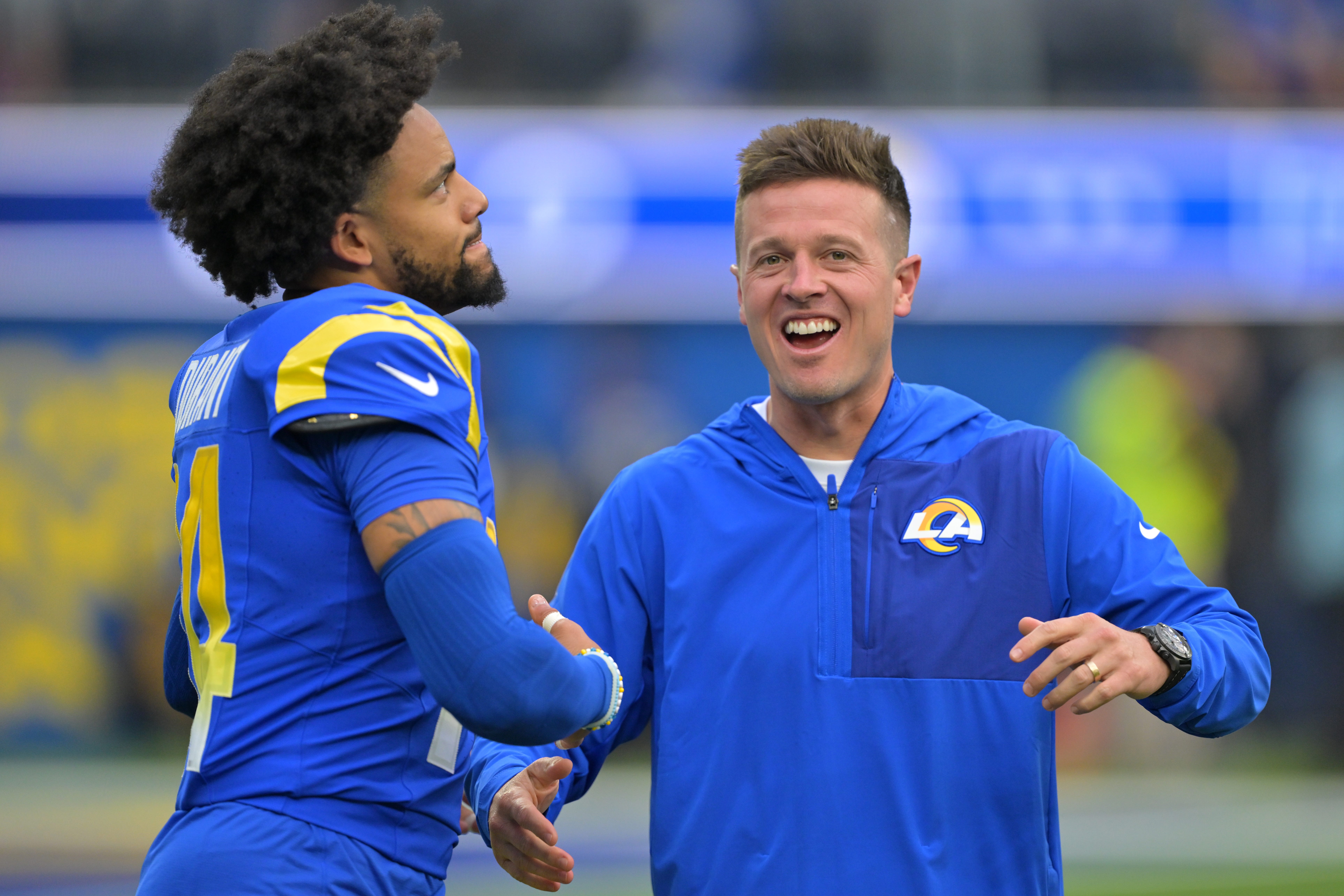 Sep 28, 2025; Inglewood, California, USA; Los Angeles Rams cornerback Cobie Durant (14) and offensive coordinator Mike LaFleur as they get ready for the game against the Indianapolis Colts at SoFi Stadium. Mandatory Credit: Jayne Kamin-Oncea-Imagn Images