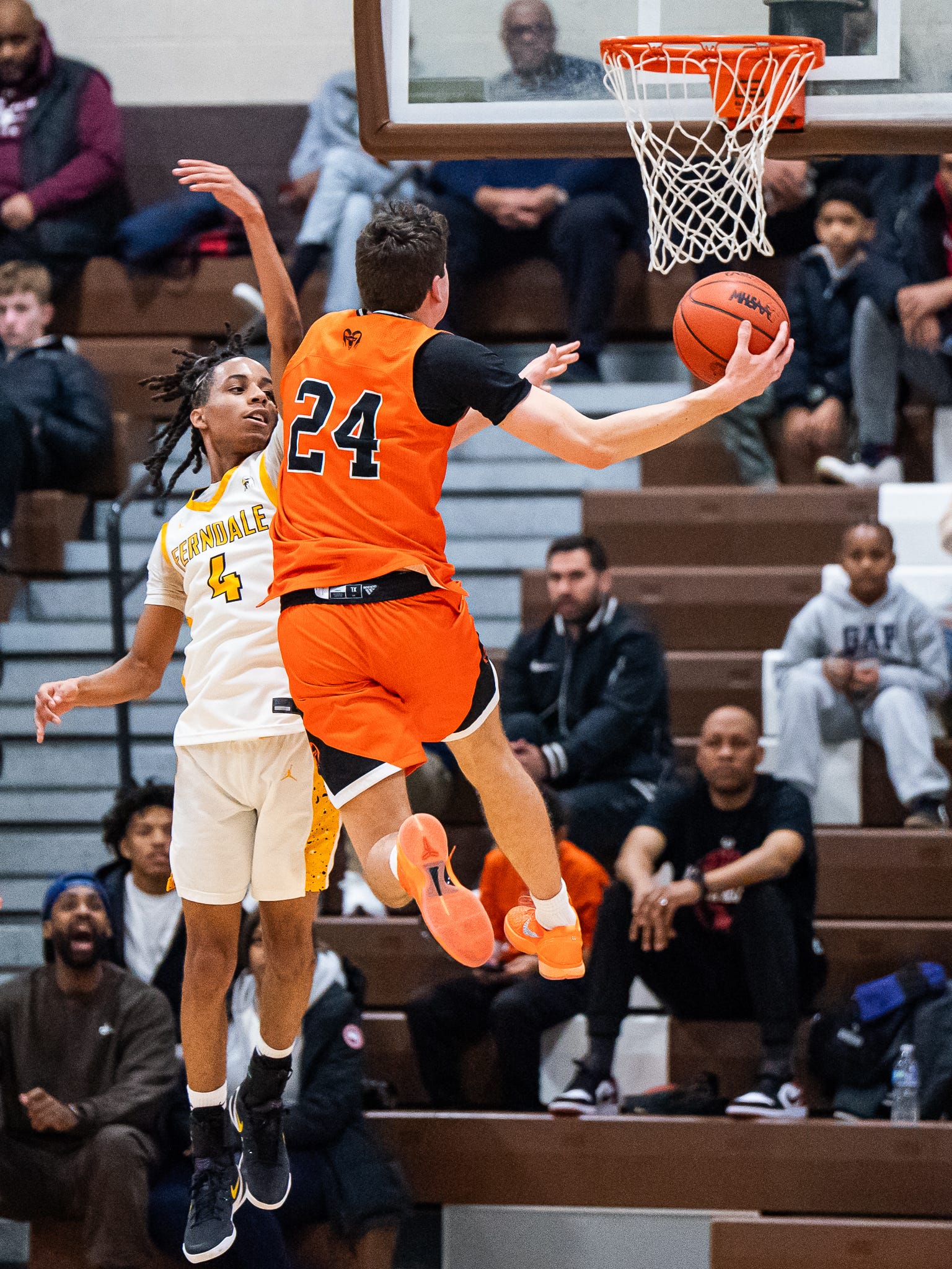 Rockford senior Jacob Bascom (24) goes for a basket against Ferndale during the second half at the 30th Annual Motor City Roundball Classic at Ferndale High School in Ferndale on Saturday, Dec. 27, 2025.