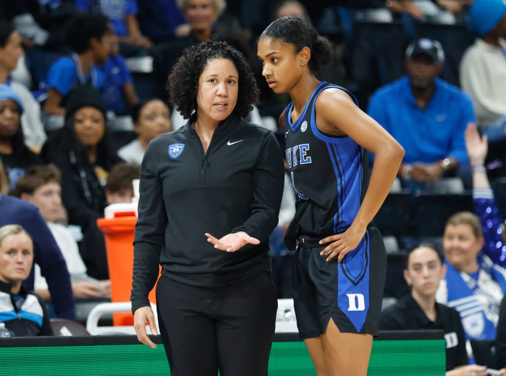 Duke Blue Devils head coach Kara Lawson speaks with Duke Blue Devils guard Riley Nelson