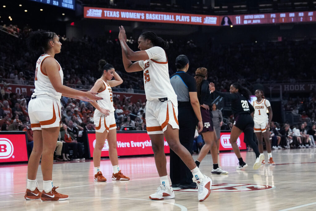 Texas Longhorns forward Madison Booker and forward Justice Carlton