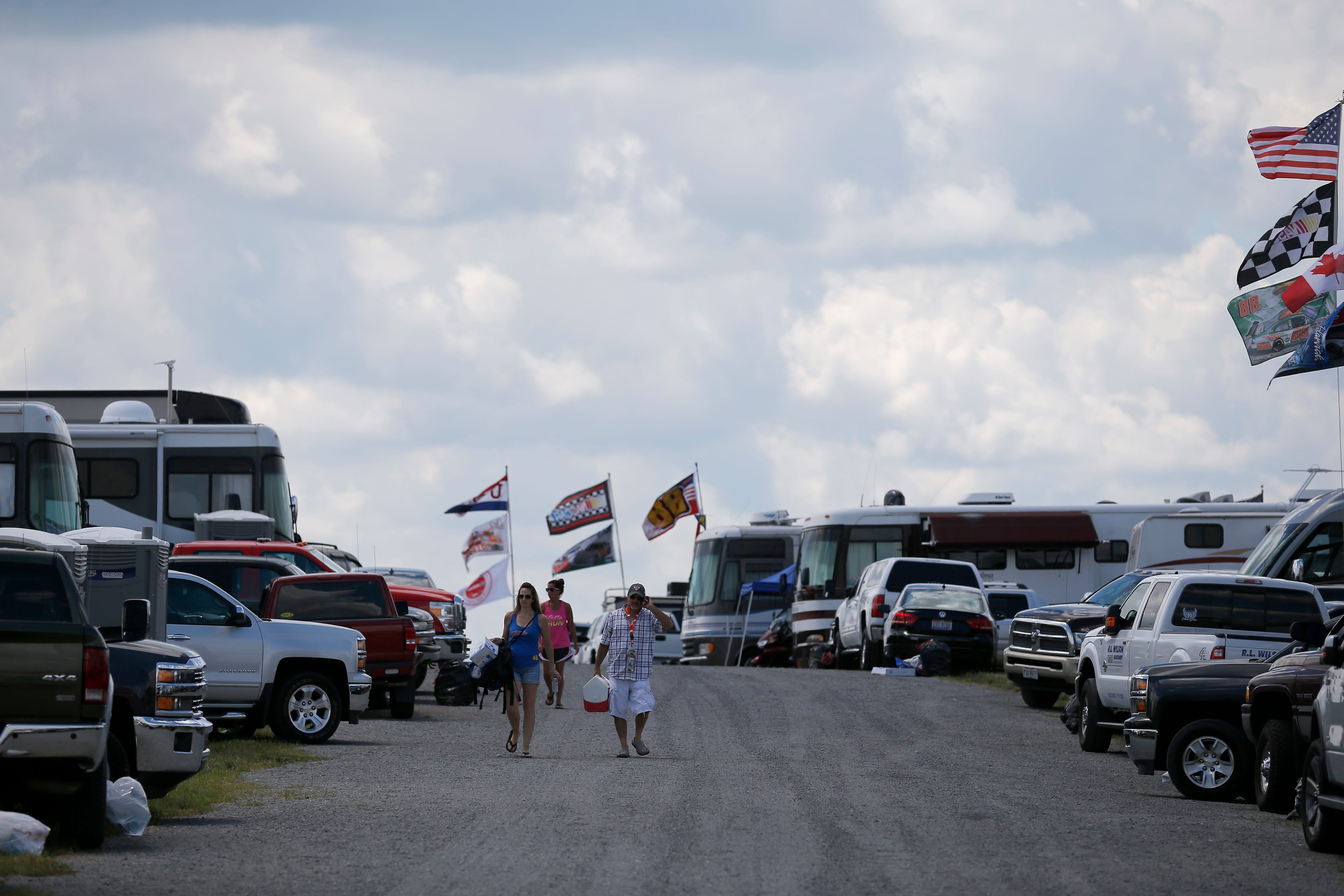 Fans leave their RVs to head for the race track the NASCAR XFINITY Series Alsco 300 race at the Kentucky Speedway in Sparta, Ky., on Saturday, July 8, 2017. (The Cincinnati Enquirer/Sam Greene) 
