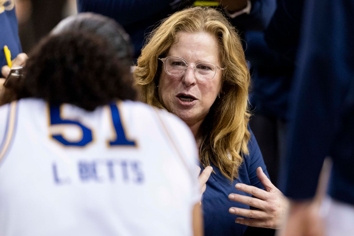 Head coach Cori Close of the UCLA Bruins talks to Lauren Betts #51 of the UCLA Bruins in the huddle during an NCAA basketball game against the Purdue Boilermakers, Wednesday January 21, 2026 in Los Angeles, Calif.