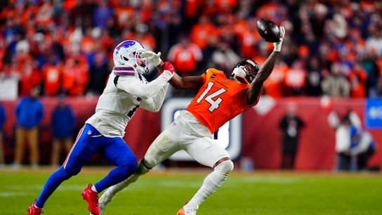 Buffalo Bills cornerback Taron Johnson (7) is called for pass interference on Denver Broncos wide receiver Courtland Sutton (14) during overtime of an AFC Divisional Round playoff game at Empower Field at Mile High.