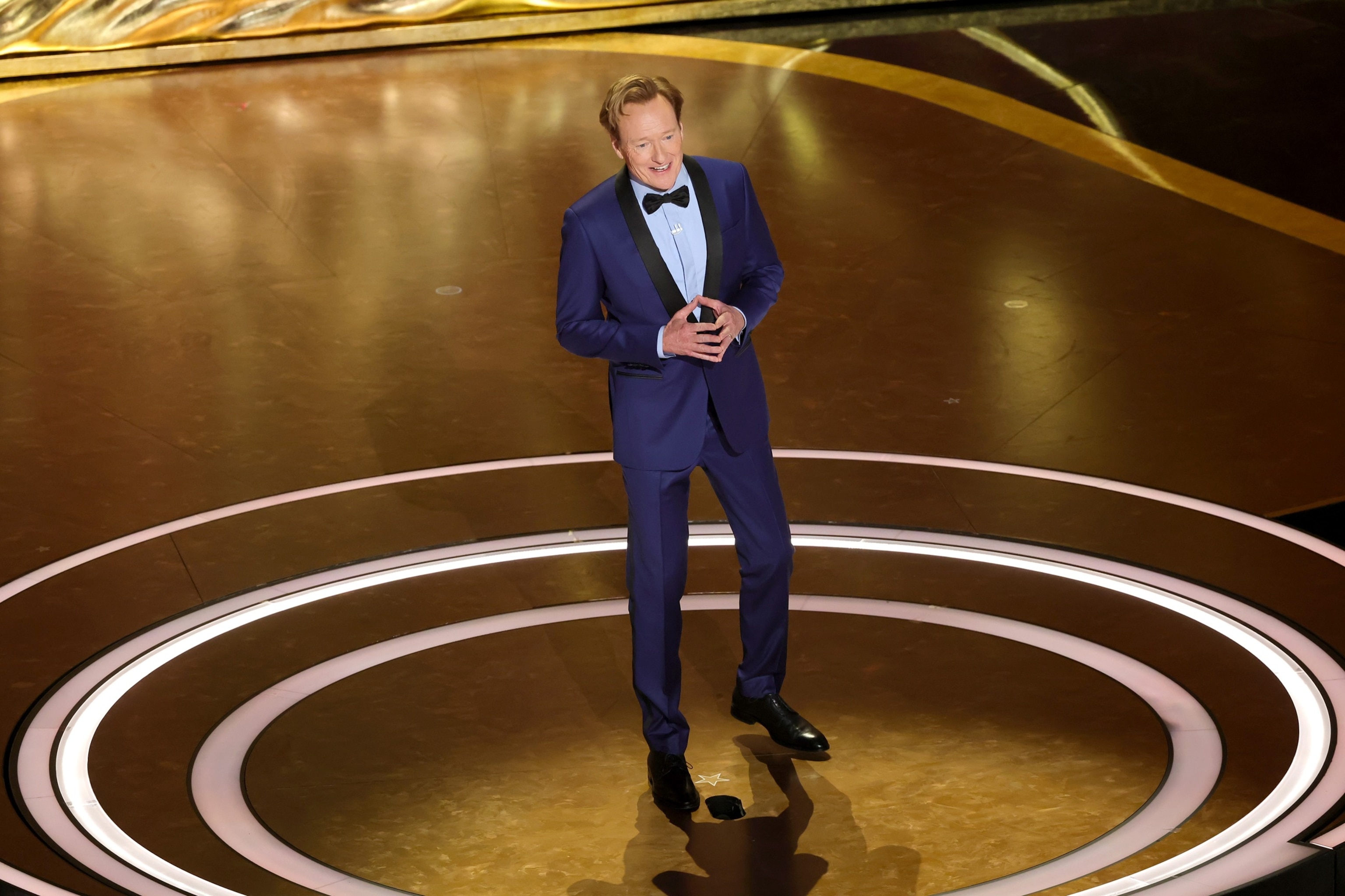 Kevin Winter/Getty Images - PHOTO: Host Conan O'Brien speaks onstage during the 97th Annual Oscars at Dolby Theatre on March 02, 2025 in Hollywood, California.