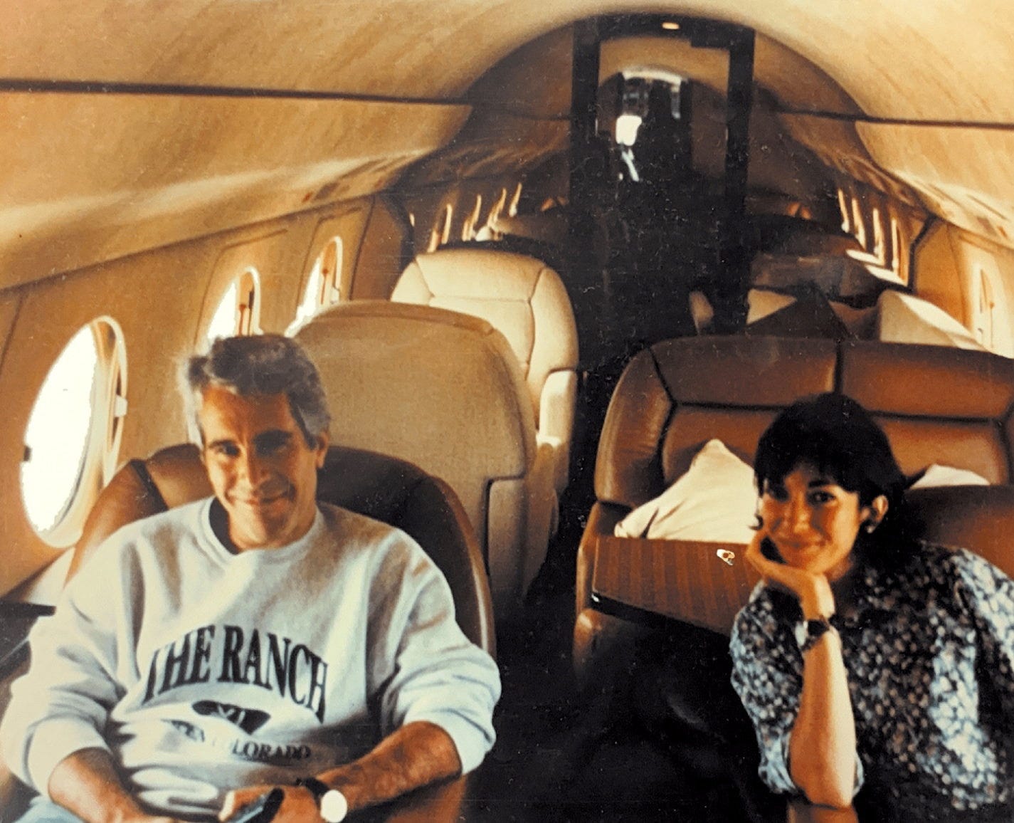 Ghislaine Maxwell and Jeffrey Epstein are seen in this image released by the Department of Justice in Washington, D.C., U.S., on December 19, 2025 as part of a new trove of documents from its investigations into late financier and convicted sex offender Jeffrey Epstein.