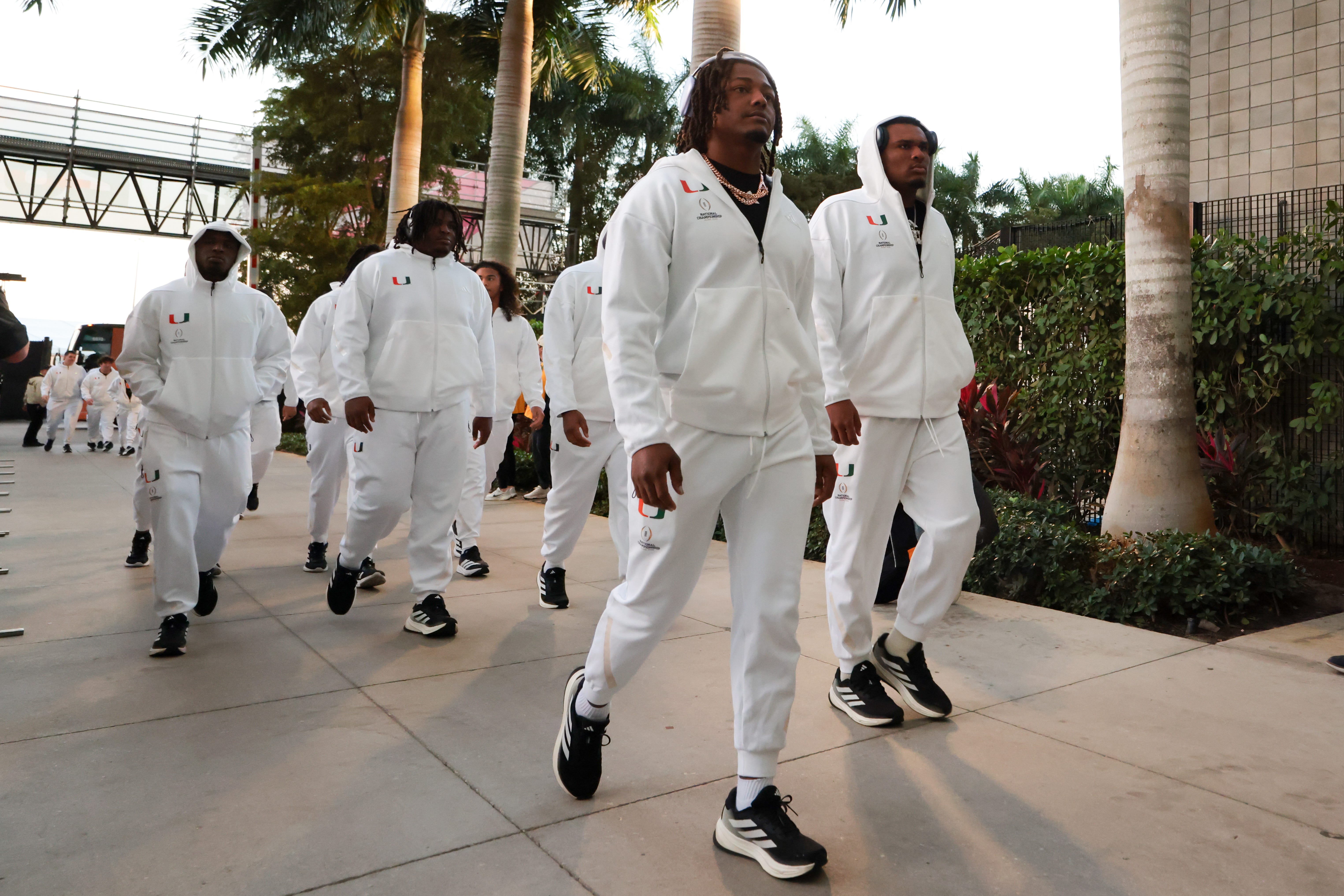 The Miami Hurricanes arrive prior to the College Football Playoff National Championship game against the Indiana Hoosiers at Hard Rock Stadium.