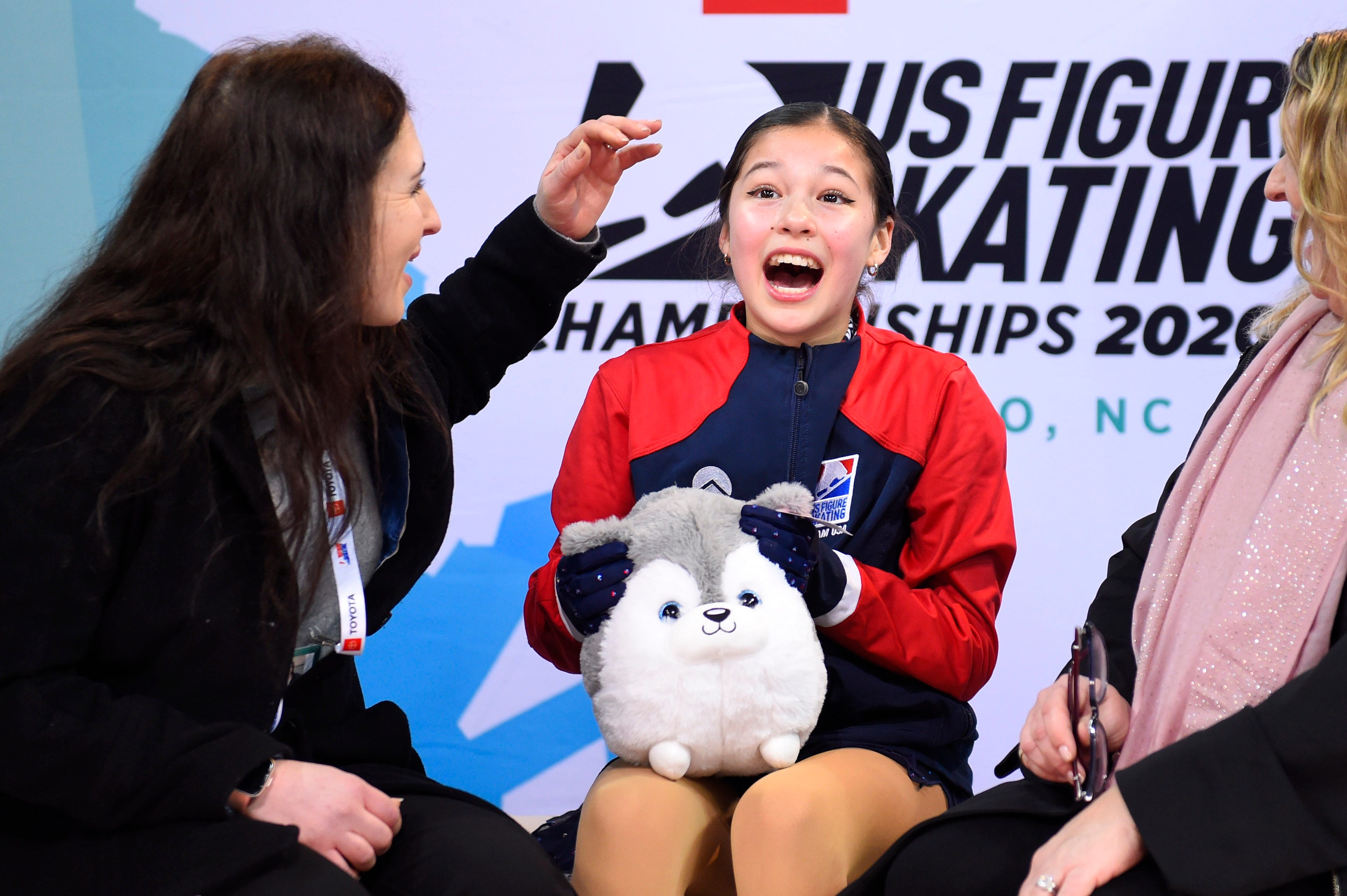Alysa Liu reacts in the kiss and cry area after the Senior Ladies Free Skate at Greensboro Coliseum Complex on Jan 24, 2020 in Greensboro, NC.