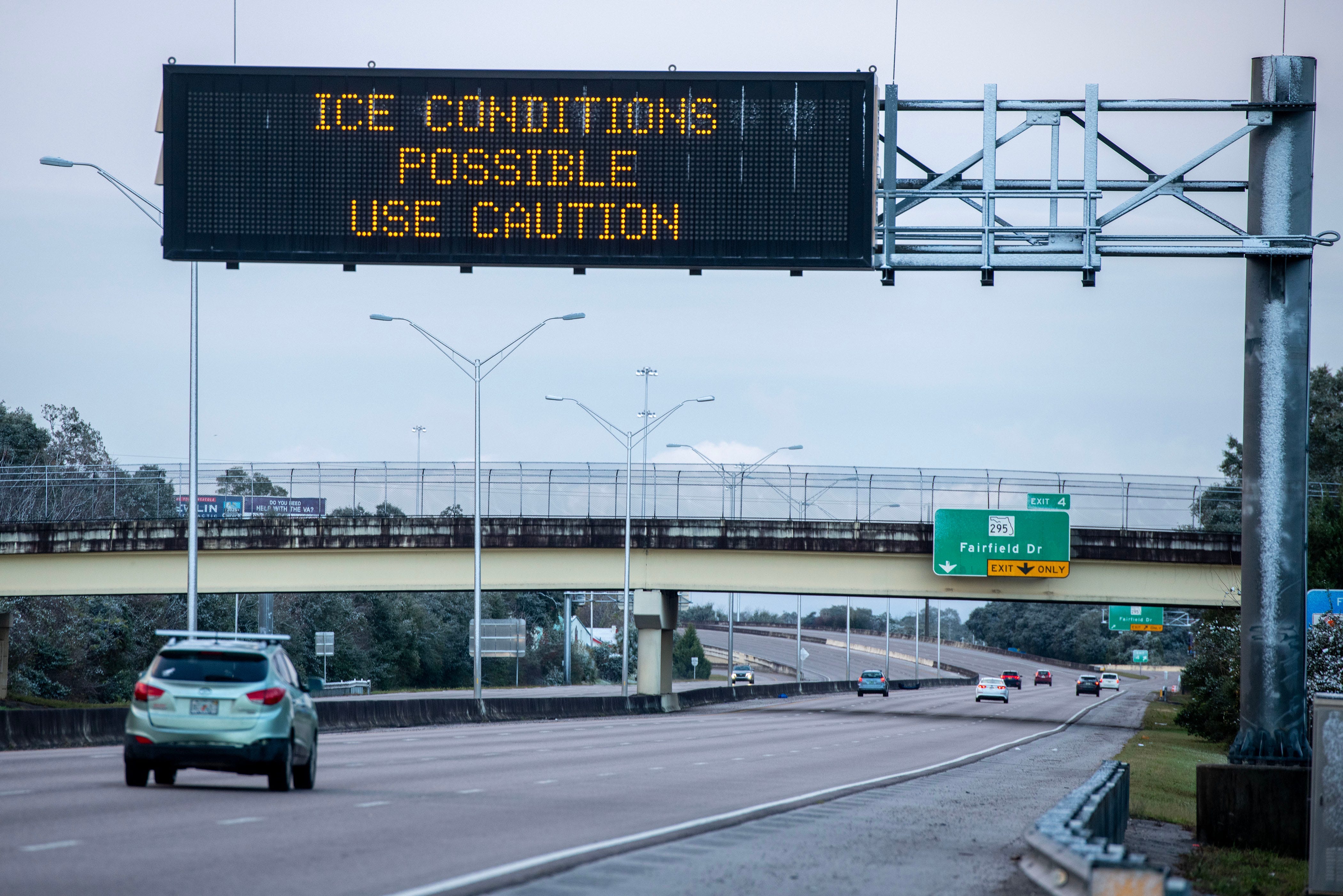 A sign warns of possible icy conditions in Pensacola, Fla. on Jan. 18, 2026.
